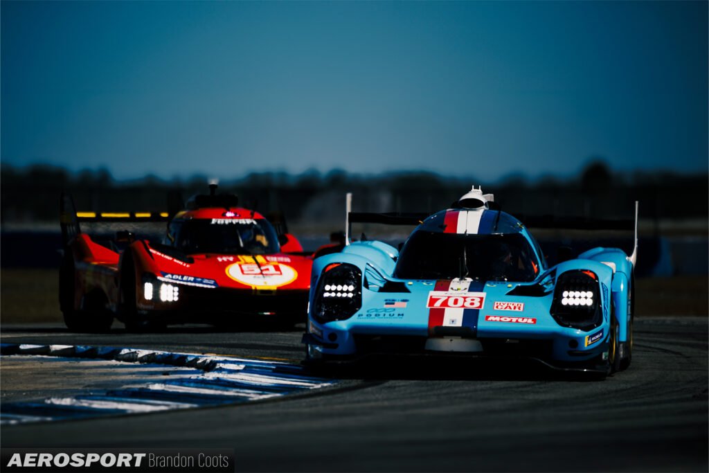 Glickenhaus 007 #708 Hypercar alongside AF Corse #51 Ferrari 499P at WEC 1000 Miles at Sebring 2023